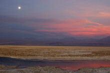 Full Moon Over Laguna De Chaxa In The Reserva Nacional Los Flamencos In Antofagasta, Chile.