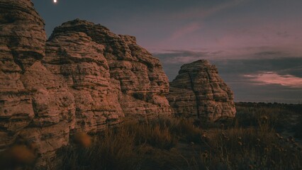 Poster - Mesmerizing view of the rock formations on the background of the pink sunset