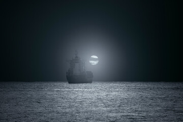 Wall Mural - commercial ship in a full moon night