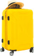 Yellow travel luggage with hat