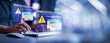 © Montri - Businessman using computer laptop with triangle caution warning sing , Http 404 error not found page template concept. Server Not Found Error Danger Caution Warning Concept. 404 Error Page Not Found.