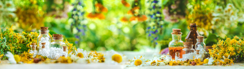 Tincture of medicinal herbs in bottles. Selective focus.