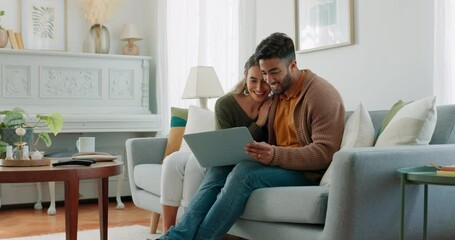Laptop, living room and couple search website information for home investment, loan or real estate property discussion on sofa. Young people on couch with pc internet, planning future together