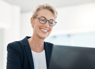 Poster - Laptop, management and design with a female CEO, manager or boss working on a project in her office. Computer, creative and typing with a mature business woman or designer at work in her company