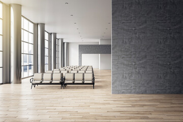 Poster - Front view on blank dark grey stone wall with place for advertisement or poster in stylish empty airport waiting area hall with seat rows and wooden floor. 3D rendering, mock up