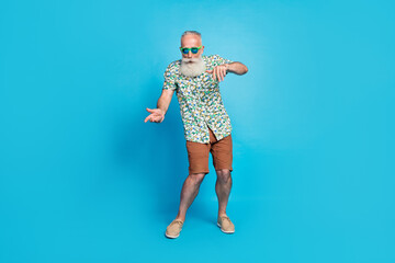 Sticker - Full length photo of old aged gray bearded man senior wear stylish outfit dancing good mood beach discotheque isolated on blue color background