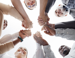 Poster - Hands, teamwork and motivation with a business team in a huddle or circle together from below. Collaboration, success and community with a man and woman employee group standing hand in hand in unity