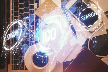 Poster - Blockchain theme hologram drawings over computer on the desktop background. Top view. Multi exposure. Concept of cryptoeconomy.