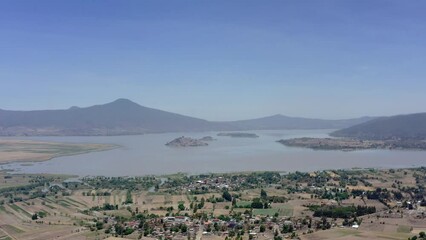 Wall Mural - Aerial: panoramic view of the islands by the lake and mountains, drone view 