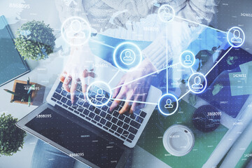 Poster - Double exposure of woman hands working on computer and social network theme hologram drawing. Top View. People connection concept.