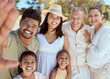 © J Maas/peopleimages.com - Happy family, selfie and smile by children relax with parents and grandparents at a park in summer, happy and excited. Love, family and portrait of kids and big family for photo in Mexico and nature