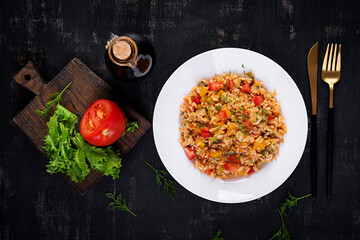 Wall Mural - Tomato rice with vegetables and chicken. Healthy food. Healthy lifestyle. Top view, overhead