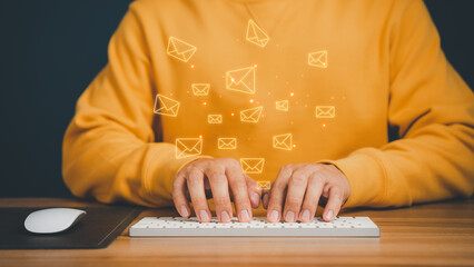 Poster - Email Marketing and Newsletters, Technology and lifestyle concepts. Man's hand using computer keyboard and sending online message with email icon.