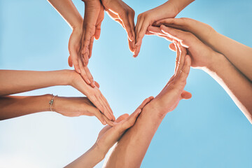 Heart, love and group hands for support, care and community with outdoor summer sunshine, blue sky and mock up. Group of people with care sign for solidarity, health and wellness background mockup
