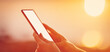 © candy1812 - Woman hands holding smartphone at outdorrs in the evening