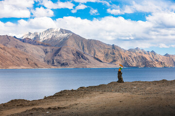 Wall Mural - India flag with Pangong lake and mountain under cloudy blue sky at Leh, Ladakh, India.