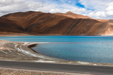 Wall Mural - Landscape scene of Pangong Lake in autumn season with mountain and blue sky at Leh, Ladakh, India.