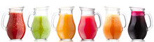 Smoothies Of Freshly Pressed Juices In Glass Pitchers, Isolated