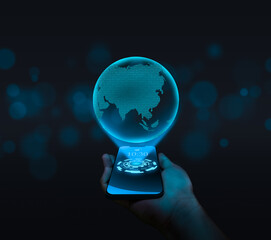 Aufkleber - hand holding mobile phone with glowing lightbulb on blue bokeh background