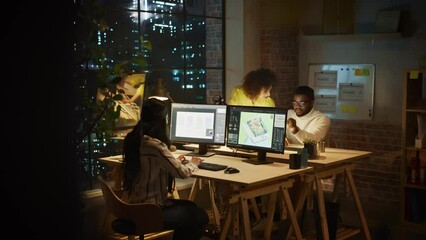 Poster - Small Diverse Multiethnic Group Collaborate on a Project and Work Together in an Office at Night. Team Leader Talking with a Professional, Laughing, Discussing Changes to a Software Design.