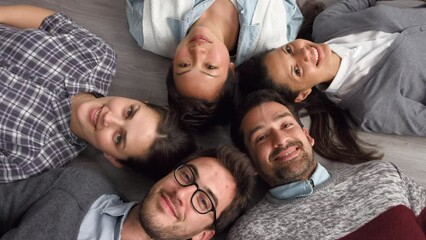 Poster - Top view, business people and support circle on floor in team building, employee collaboration and worker trust. Portrait, smile or happy creative men, women and designers in company or office huddle