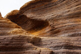 Fototapeta Sawanna - Pofalowane i zwietrzałe powierzchnie skały zastygłej lawy.