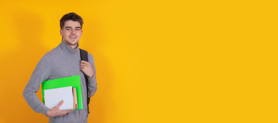 Wall Mural - student with books isolated on background