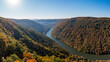 View up the Cheat River in narrow wooded gorge in the autumn. Coopers Rock Forest is near Morgantown, West Virginia