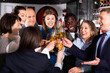 © JackF - International group of glad cheerful smiling businesspeople toasting with champagne, having fun at office party in nightclub