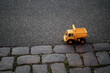 Yellow toy truck on the ground