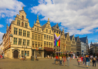 Wall Mural - Grote markt of Antwerp, Belgium. Typical belgian buildings decorated with large lgbt flag.