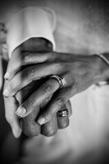 bride and groom holding hands