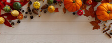 Autumn Flat Lay With Leaves, Pumpkins And Berries. Thanksgiving Concept With Copy Space.