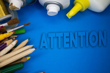 Poster - Overhead shot of school supplies with Attention text. Brushes, pencils, artistic tools. Art And Craft Work Tools.