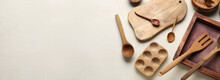 Wooden Cooking Utensils On Light Background With Space For Text, Top View