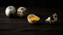 Quail Eggs On Wood Background