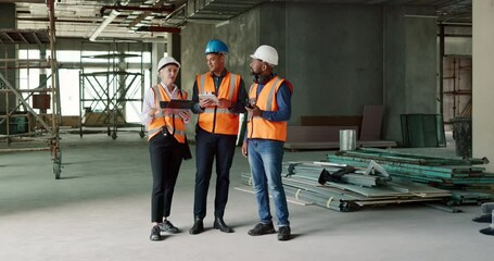 Poster - Building, planning and architects talking about construction, industrial architecture and design of a house with a tablet. Development, maintenance and renovation of infrastructure of home by workers
