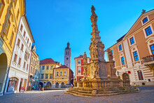 The Plague Column With Clocktower Of St James Church In Background, Kutna Hora, Czech Republic