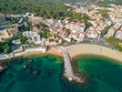 Sant Feliu de Guíxols on the Costa Brava of Gerona tourist beach turquoise Mediterranean sea panoramic view aerial view