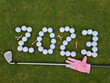 Leinwandbild Motiv Golf 2023 New Year number with golf ball on grass field relief of a sports club