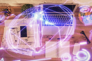Poster - Education hologram drawings over computer on the desktop background. Top view. Multi exposure.