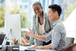 © Wesley J/peopleimages.com - Asian businessman, black woman or computer help in digital marketing startup, advertising agency or creative office. Smile, happy or collaboration teamwork with technology in growth strategy planning
