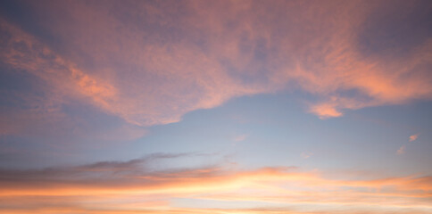 dreamy sunset sky in pastel tones, pink yellow and light blue