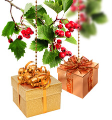 Wall Mural - golden and copper christmas present boxes with hawthorn berries branch isolated