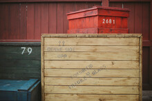 Four Multi Coloured Wooden Shipping Crates