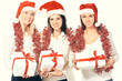 © yurolaitsalbert - group of female students in costume of Santa Claus with Christmas gifts .