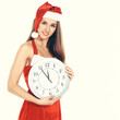 © yurolaitsalbert - closeup.beautiful young woman in Christmas costume with the large clock.isolated on white