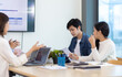 © Wasan - Young people meeting to discuss successful business projects in the office. Human relations and working with colleagues in the organization happily.