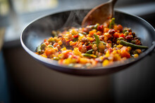 Cooking Tasty Vegetable Mix With Corn, Pea, Beans In Pan On Kitchen