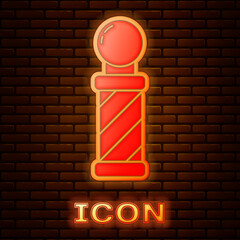 Sticker - Glowing neon Classic Barber shop pole icon isolated on brick wall background. Barbershop pole symbol. Vector Illustration